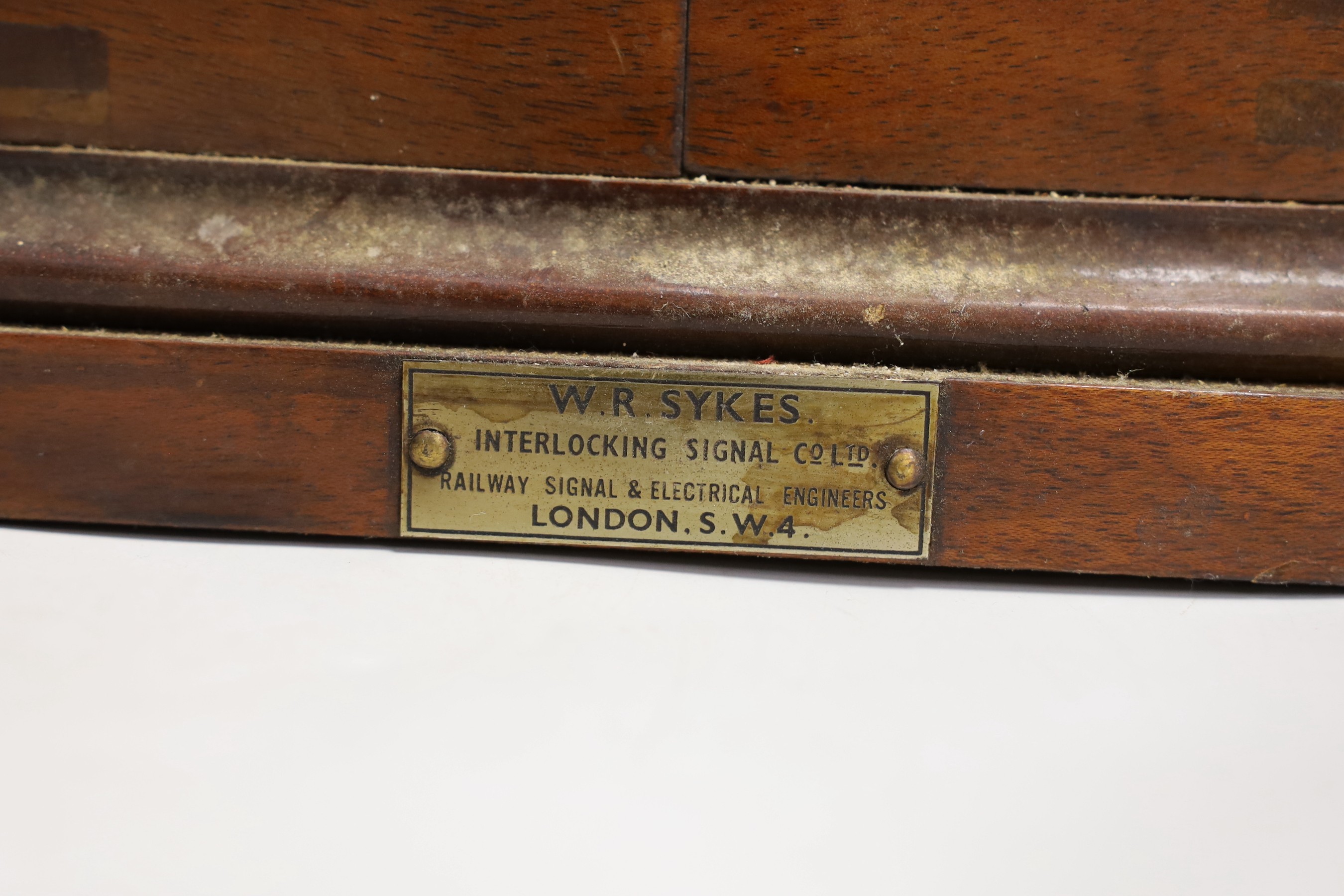 Two W.R.Sykes mahogany small signal box bells, one bears manufacturer's plaque